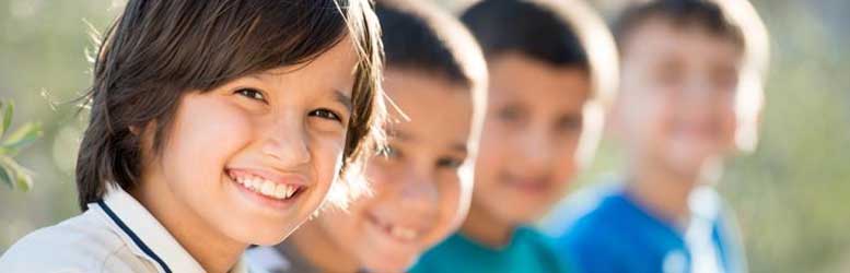 Child safe environments Child safe environments - children sitting and smiling